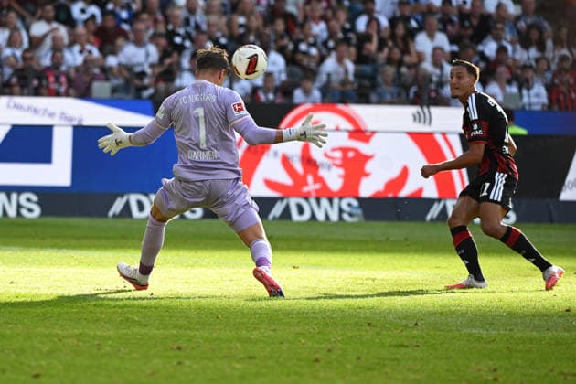 06.09.2026, xpsx, Fussball 1.Bundesliga, Eintracht Frankfurt - FC Augsburg v.l. Finn Dahmen (FC Augsburg) Younes Ebnoutalib (Eintracht Frankfurt) Zweikampf, Aktion, action, battle for the ball (DFL DFB REGULATIONS PROHIBIT ANY USE OF PHOTOGRAPHS as IMAGE SEQUENCES and or QUASI-VIDEO) Frankfurt am Main *** September 6, 2026, xpsx, Soccer, Bundesliga 1, Eintracht Frankfurt vs. FC Augsburg, Finn Dahmen (FC Augsburg) vs. Younes Ebnoutalib (Eintracht Frankfurt), tackle, action, battle for the ball. DFL and DFB regulations prohibit any use of photographs as image sequences and or quasi-video. Frankfurt am Main
