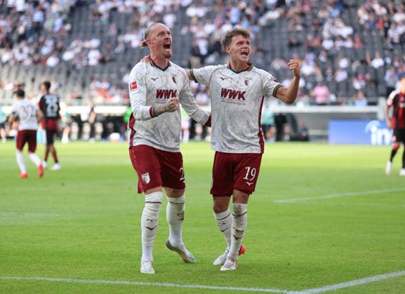 06.09.2026, Fussball Bundesliga, Eintracht Frankfurt - FC Augsburg, v.l., Torjubel zum 1:2 durch Robin Fellhauer (FC Augsburg), Goal celebration, celebrate the goal, Marius Wolf (FC Augsburg) DFL DFB REGULATIONS PROHIBIT ANY USE OF PHOTOGRAPHS AS IMAGE SEQUENCES AND OR QUASI-VIDEO. xdcx *** September 6, 2026, Bundesliga, Eintracht Frankfurt vs. FC Augsburg, from left, Robin Fellhauer (FC Augsburg) celebrating the 1-2 goal, goal celebration, celebrating the goal, Marius Wolf, FC Augsburg. DFL and DFB regulations prohibit any use of photographs as image sequences and or quasi-video. xdcx Copyright: HMBxMedia Claus