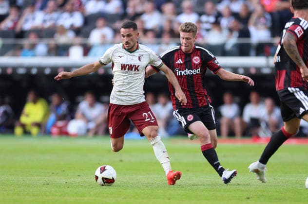 06.09.2026, Fussball Bundesliga, Eintracht Frankfurt - FC Augsburg, v.l., Arijon Ibrahimovic (FC Augsburg), Elias Baum (Eintracht Frankfurt) DFL DFB REGULATIONS PROHIBIT ANY USE OF PHOTOGRAPHS AS IMAGE SEQUENCES AND OR QUASI-VIDEO. xdcx *** September 6, 2026, Soccer Bundesliga, Eintracht Frankfurt vs. FC Augsburg, from left: Arijon Ibrahimovic (FC Augsburg), Elias Baum (Eintracht Frankfurt). DFL and DFB regulations prohibit any use of photographs as image sequences and or quasi-video. xdcx Copyright: HMBxMedia Claus