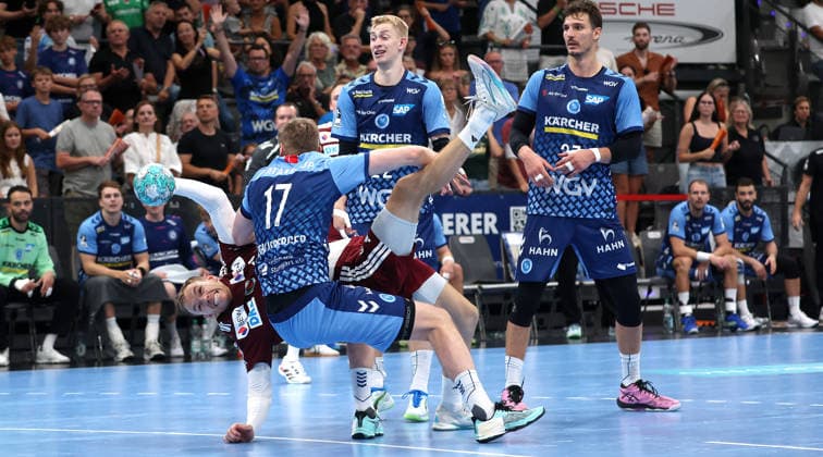 2026.09.06, Deutschland, Stuttgart, Handball TVB Stuttgart vs. Füchse Berlin, v.l. Mathias Gidsel (Berlin), Samuel Röthlisberger (TVB),Torben Matzken (TVB), Philipp Meyer (Berlin)