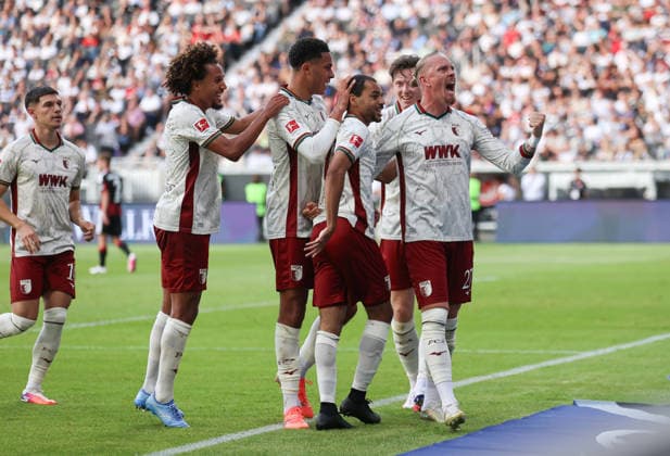 06.09.2026, Fussball Bundesliga, Eintracht Frankfurt - FC Augsburg, v.l., Torjubel zum 1:3 durch Alexis Claude-Maurice (FC Augsburg), Goal celebration, celebrate the goal, Marius Wolf (FC Augsburg) DFL DFB REGULATIONS PROHIBIT ANY USE OF PHOTOGRAPHS AS IMAGE SEQUENCES AND OR QUASI-VIDEO. xdcx *** September 6, 2026, Bundesliga, Eintracht Frankfurt vs. FC Augsburg, from left, goal celebration for the 1-3 goal by Alexis Claude Maurice of FC Augsburg, goal celebration, celebrating the goal, Marius Wolf, FC Augsburg. DFL and DFB regulations prohibit any use of photographs as image sequences and or quasi-video. xdcx Copyright: HMBxMedia Claus