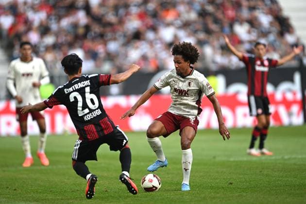 Fußball 1. Bundesliga 2. Spieltag Eintracht Frankfurt - FC Augsburg am 06.09.2026 im Deutsche Bank Park in Frankfurt Keita Kosugi ( Frankfurt ), links - Han-Noah Massengo ( Augsburg ), rechts DFL regulations prohibit any use of photographs as image sequences and or quasi-video. *** Soccer, Bundesliga 1, Matchday 2: Eintracht Frankfurt vs. FC Augsburg on September 6, 2026, at Deutsche Bank Park in Frankfurt. Keita Kosugi (Frankfurt, left), Han Noah Massengo (Augsburg, right). DFL regulations prohibit any use of photographs as image sequences and or quasi-video. xJKx