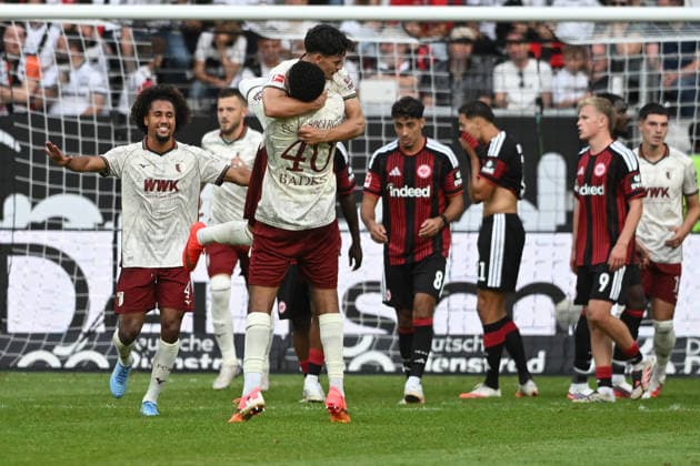06.09.2026, xpsx, Fussball 1.Bundesliga, Eintracht Frankfurt - FC Augsburg v.l. Torjubel nach dem Tor zum celebrating the goal celebrate 1:4 durch Fabian Rieder (FC Augsburg) (DFL DFB REGULATIONS PROHIBIT ANY USE OF PHOTOGRAPHS as IMAGE SEQUENCES and or QUASI-VIDEO) Frankfurt am Main *** September 6, 2026, xpsx, Soccer, Bundesliga 1, Eintracht Frankfurt vs. FC Augsburg: Goal celebration after Fabian Rieder’s goal for FC Augsburg (1–4). DFL and DFB regulations prohibit any use of photographs as image sequences and or quasi-video. Frankfurt am Main