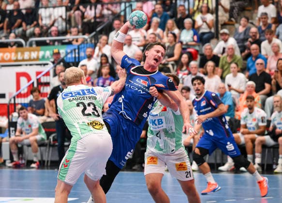 Handball 1. Bundesliga 2025 2026 06.09.2026 HBW Balingen - Weilstetten - SC Magdeburg Mex Raguse (Mitte, HBW Balingen-Weilstetten) gegen Magnus Saugstrup (li, SC Magdeburg)
