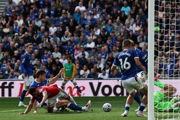 6th September 2026; Hill Dickinson Stadium, Liverpool, England; Premier League Football, Everton versus Manchester United, ManU Matheus Cunha of Manchester United is tackled by James Tarkowski of Everton DavidxBlunsden