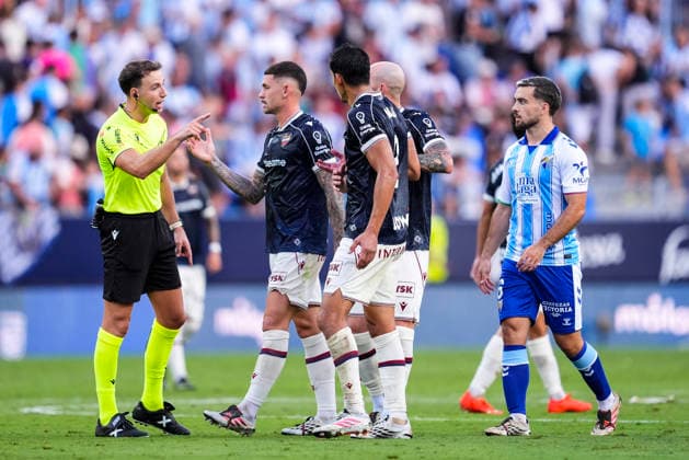 September 6, 2026, Malaga, Malaga, Spain: Aissa Mandi of Levante UD see the yellow card during the Spanish league, LaLiga EA Sports, football match played between Malaga CF and Levante UD at La Rosaleda stadium on September 6, 2026, in Malaga, Spain. Malaga CF V Levante UD - LaLiga EA Sports  - ZUMAa181 20260906_zaa_a181_208 Copyright: xJoaquinxCorcherox