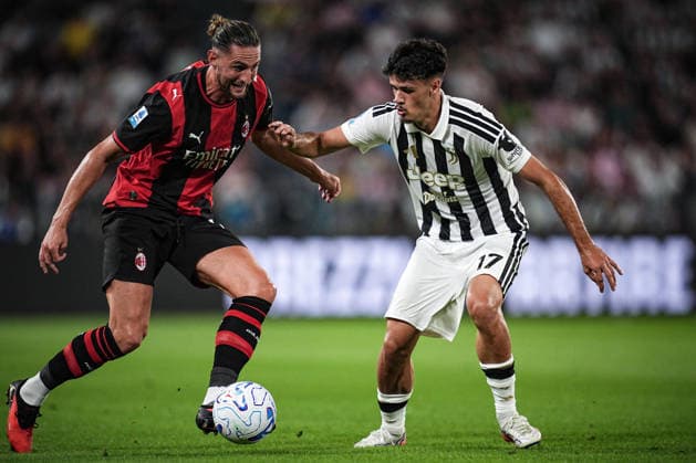 MilanÕs Adrien Rabiot fights for the ball with Juventus s Kerim Alajbegovic during the Serie A soccer match between Juventus and Milan at the Allianz Stadium in Turin, north west Italy - Sunday, September 06, 2026. - Soccer .  Copyright: xMarcoxAlpozzi LaPressex