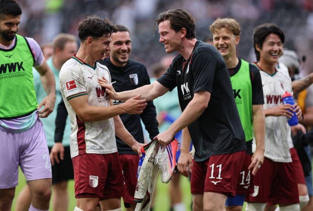 06.09.2026, Fussball Bundesliga, Eintracht Frankfurt - FC Augsburg, v.l., Fabian Rieder (FC Augsburg), Michael Gregoritsch (FC Augsburg) jubelnd bejubelt jubelt jubeln celebrate DFL DFB REGULATIONS PROHIBIT ANY USE OF PHOTOGRAPHS AS IMAGE SEQUENCES AND OR QUASI-VIDEO. xdcx *** September 6, 2026, Bundesliga, Eintracht Frankfurt vs. FC Augsburg, from left: Fabian Rieder (FC Augsburg), Michael Gregoritsch (FC Augsburg) celebrating, cheering, DFL and DFB regulations prohibit any use of photographs as image sequences and or quasi-video xdcx Copyright: HMBxMedia Claus