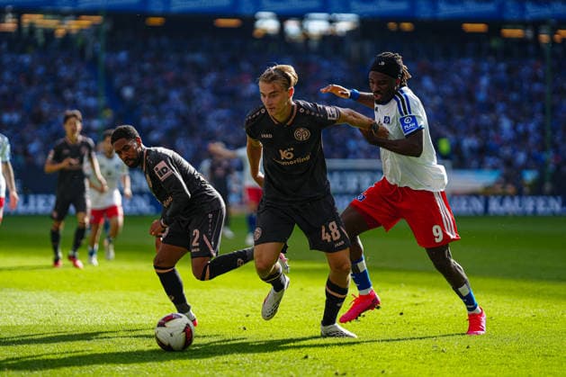 Kacper Potulski (1. FSV Mainz 05, 48), Terem Moffi (Hamburger SV, 09) GER, Hamburger SV vs. 1. FSV Mainz 05, Fußball, 1. Bundesliga, Spieltag 02, Saison 2026 2027, 06.09.2026 DFL REGULATIONS PROHIBIT ANY USE OF PHOTOGRAPHS AS IMAGE SEQUENCES AND OR QUASI-VIDEO GER, Hamburger SV vs. 1. FSV Mainz 05, Fußball, 1. Bundesliga, Spieltag 02, Saison 2026 2027, 06.09.2026 Hamburg *** Kacper Potulski, 1. FSV Mainz 05, 48, Terem Moffi, Hamburger SV, 09 GER, Hamburger SV vs. 1. FSV Mainz 05, Soccer, Bundesliga 1, Matchday 02, 2026–2027 Season, September 6, 2026 DFL regulations prohibit any use of photographs as image sequences and or quasi-video GER, Hamburger SV vs. 1 FSV Mainz 05, soccer, 1st Bundesliga, Matchday 02, 2026–2027 Season, September 6, 2026, Hamburg Copyright: xEibner-Pressefoto MarcelxvonxFehrnx EP_MFN