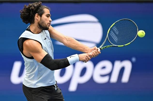 (260907) -- NEW YORK, Sept. 7, 2026 -- Carlos Alcaraz of Spain hits a return during the men s singles fourth round match between Carlos Alcaraz of Spain and Tommy Paul of the United States, at the 2026 US Open tennis championships in New York, the United States, Sept. 6, 2026. ) (SP)U.S.-NEW YORK-TENNIS-US OPEN-MEN S SINGLES LixRui 