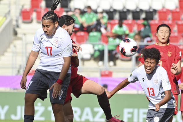 SOCCER - FIFA World Cup, WM, Weltmeisterschaft, Fussball - U-20 Women s - New Caledonia vs. China PR Photo by IPA ABACAPRESS.COM88243064 - Deyanera Michel (NCL), Jiaxin Huang (CHN), and Emmanuelle Buama (NCL) during the FIFA U-20 Women s World Cup match between New Caledonia and China PR in Sosnowiec, Poland, on September 7, 2026 Sosnowiec Poland  Copyright: xIPAxSport ABACAx