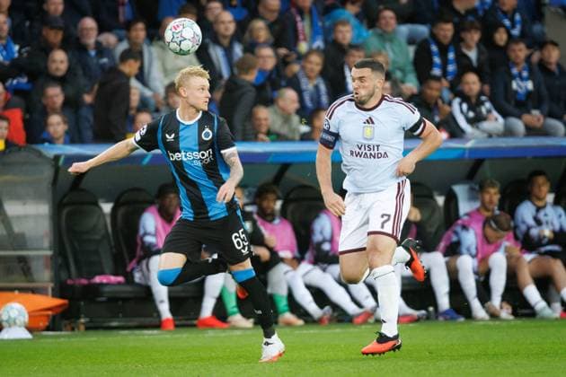 Club s Joaquin Seys and Aston Villa s John McGinn fight for the ball during a soccer game between Belgian soccer team Club Brugge KV and English Aston Villa FC, on Tuesday 8 September 2026 in Brugge, on the first game of the UEFA Champions League league phase. KURTxDESPLENTER  x185682810x