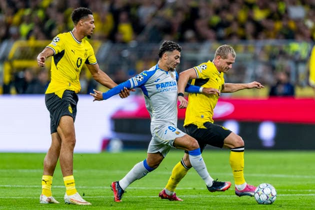 DORTMUND - (l-r) Borussia Dortmund midfielder Felix Nmecha, Villarreal CF forward Georges Mikautadze and Borussia Dortmund defender Julian Ryerson during the UEFA Champions League match between Borussia Dortmund and Villarreal at BVB Stadion Dortmund on 8 September 2026 in Dortmund, Germany. (Photo by DeFodi Images) -