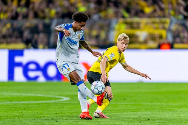 DORTMUND - Villarreal CF forward Tajon Buchanan and Borussia Dortmund defender Daniel Svensson during the UEFA Champions League match between Borussia Dortmund and Villarreal at BVB Stadion Dortmund on 8 September 2026 in Dortmund, Germany. (Photo by DeFodi Images) -