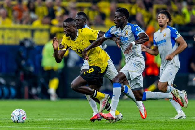 DORTMUND - (l-r) Borussia Dortmund forward Serhou Guirassy and Villarreal CF midfielder Tani Oluwaseyi during the UEFA Champions League match between Borussia Dortmund and Villarreal at BVB Stadion Dortmund on 8 September 2026 in Dortmund, Germany. (Photo by DeFodi Images) -