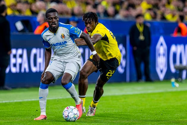 DORTMUND - (l-r) Villarreal CF midfielder Tani Oluwaseyi and Borussia Dortmund defender Joane Gadou during the UEFA Champions League match between Borussia Dortmund and Villarreal at BVB Stadion Dortmund on 8 September 2026 in Dortmund, Duitsland. (Photo by DeFodi Images) -