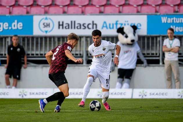 v.li.: Tino Bradara (SGV, 2), Mert Tasdelen (SVS, 11), Zweikampf, Spielszene, Duell, duel, tackle, tackling, Dynamik, Action, Aktion, 08.09.2026, Sandhausen (Deutschland), Fussball, Regionalliga Südwest, SV Sandhausen - SGV Heilbronn-Freiberg