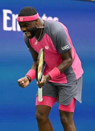 Frances Tiafoe reacts against Alex Michelsen during the quarter finals in Arthur Ashe Stadium at the 2026 US Open Tennis Championship held at the USTA Billie Jean King National Tennis Center in New York City on Tuesday, September 8, 2026.  NYP20260908517 LARRYxMARANO