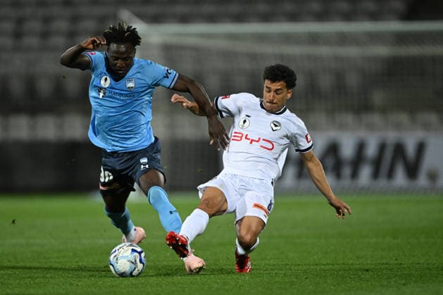 AUSTRALIA CUP SYDNEY VICTORY, Oriola Sunday of Sydney FC and Jordi Valadon of the Victory during the Australia Cup semi-final between Sydney FC and Melbourne Victory at Jubilee Stadium in Sydney, Wednesday, September 9, 2026. ( NO ARCHIVING, EDITORIAL USE ONLY SYDNEY NEW SOUTH WALES AUSTRALIA  Copyright: xDEANxLEWINSx 20260909154756293298