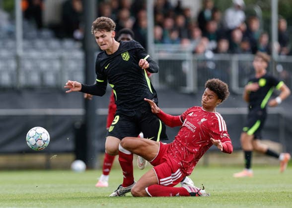Liverpool, England, 9th September 2026. Prince Cisse of Liverpool tackles Miguel Cubo of Atletico Madrid during the Liverpool U19 vs Atletico Madrid U19 UEFA Youth League match at The Liverpool Football Academy, Liverpool. Picture credit should read: Cody Froggatt Sportimage EDITORIAL USE ONLY. No use with unauthorised audio, video, data, fixture lists, club league logos or live services. Online in-match use limited to 120 images, no video emulation. No use in betting, games or single club league player publications. SPI_008_CF_LIVERPOOL_U19_V_ATLETICO_MADRID_U19 SPI-4986-0008