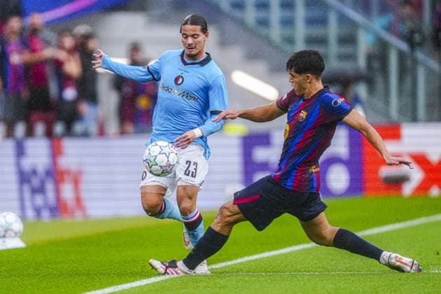 BARCELONA - Anis Hadj Moussa of Feyenoord battles for possession with Pau Cubarsi of FC Barcelona, Barca during the UEFA Champions League match between FC Barcelona and Feyenoord at the Spotify Camp Nou on 09 September 2026 in Barcelona, Spain. GEERT VAN ERVEN ANP UEFA Champions League 2026 27 xVIxANPxSportx xMarcelxterxBalsxIVx 567769788 originalFilename: 567769788.jpg
