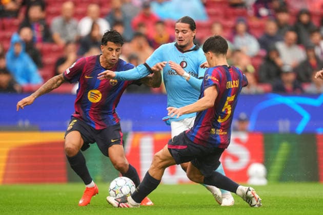 UEFA Champions League: FC Barcelona, Barca v Feyenoord Rotterdam Barcelona - Joao Cancelo of FC Barcelona battles for possession with Anis Hadj Moussa of Feyenoord Rotterdam during the first competition round of the 2026 2027 UEFA Champions League season. The match is set between FC Barcelona and Feyenoord Rotterdam at Camp Nou on 9 September 2026 in Barcelona, Spain. (Hero Images Yannick Verhoeven) Copyright: xYannickxVerhoevenx