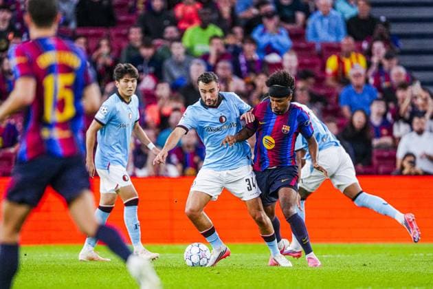 BARCELONA - Karim Adeyemi of FC Barcelona, Barca battles for possession with Charles Vanhoutte of Feyenoord during the UEFA Champions League match between FC Barcelona and Feyenoord at the Spotify Camp Nou on 09 September 2026 in Barcelona, Spain. GEERT VAN ERVEN ANP UEFA Champions League 2026 27 xVIxANPxSportx xMarcelxterxBalsxIVx 567776127 originalFilename: 567776127.jpg