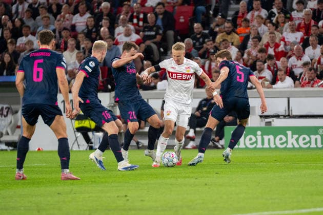 Chris Fuehrich (VfB Stuttgart, 10) im Dribbling gegen Gianni Stensness (Viking FK, 06), Henrik Bjoerdal (Viking FK, 16), Peter Christiansen (Viking FK, 20) und Henrik Heggheim (Viking FK, 05), VfB Stuttgart vs. Viking FK, Fussball, Champions League, 1. Spieltag, 09.09.2026, DFB regulations prohibit any use of photographs as image sequences and or quasi-video Stuttgart Baden-Wuerttemberg Deutschland