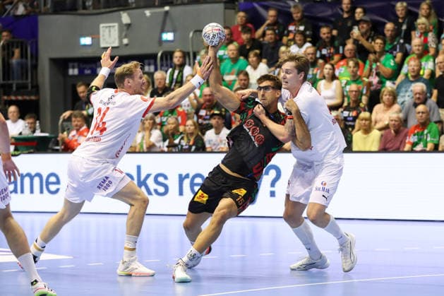 09.09.2026, xgox, Handball - EHF Champions League SC Magdeburg - Kolstad Handbold v.l. Magnus Gullerud (Kolstad, 14), Antonio Serradilla (Magdeburg, 15), Emre Christoffer Berge (Kolstad, 3) Zweikampf, Duell, Kampf, tackle Magdeburg