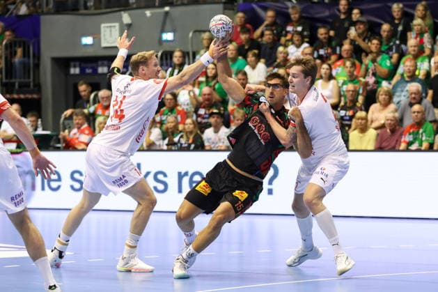 09.09.2026, xgox, Handball - EHF Champions League SC Magdeburg - Kolstad Handbold v.l. Magnus Gullerud (Kolstad, 14), Antonio Serradilla (Magdeburg, 15), Emre Christoffer Berge (Kolstad, 3) Zweikampf, Duell, Kampf, tackle Magdeburg