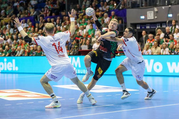 09.09.2026, xgox, Handball - EHF Champions League SC Magdeburg - Kolstad Handbold v.l. Magnus Gullerud (Kolstad, 14), Gisli Thorgeir Kristjansson (Magdeburg, 10), Mishels Liaba (Kolstad, 44) Zweikampf, Duell, Kampf, tackle Magdeburg