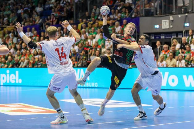 09.09.2026, xgox, Handball - EHF Champions League SC Magdeburg - Kolstad Handbold v.l. Magnus Gullerud (Kolstad, 14), Gisli Thorgeir Kristjansson (Magdeburg, 10), Mishels Liaba (Kolstad, 44) Zweikampf, Duell, Kampf, tackle Magdeburg