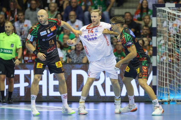 09.09.2026, xtgx, Handball Champions LegaueL, SC Magdeburg - Kolstad Handbold emspor, v.l. Oscar Bergendahl (Magdeburg, 54), Magnus Gullerud (Kolstad, 14), Antonio Serradilla Cuenca (Magdeburg, 15) Zweikampf, Duell, Kampf, tackle Magdeburg