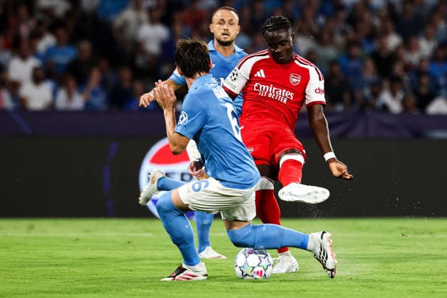 Billy Gilmour of SSC Napoli , Bukayo Saka of Arsenal and Stanislav Lobotka of SSC Napoli during the UEFA Champions League 2026 2027 football match between SSC Napoli and Arsenal FC at Diego Armando Maradona stadium in Naples, (Italy), September 9, 2026. cesarexpurini
