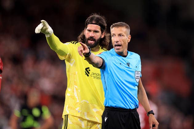 Liverpool v Atletico Madrid 09 September 2026 - UEFA Champions League - League Phase - Liverpool v Atletico Madrid - Liverpool goalkeeper Alisson Becker and referee Davide Massa - Photo: Simon Stacpoole Offside. Liverpool UK Copyright: xSimonxStacpoolexOffside