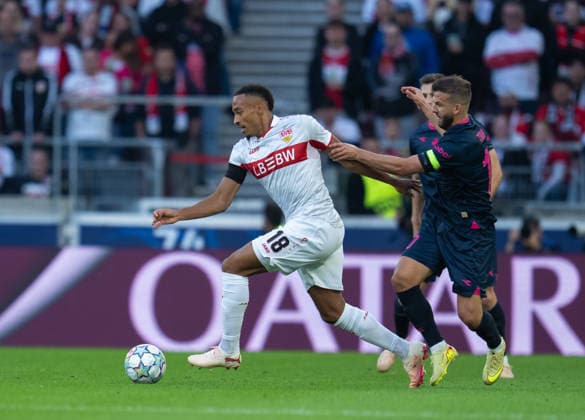 Zlatko Tripic of Viking FK defends against Jamie Leweling of VfB Stuttgart during UEFA Champions League - Matchday 1 season 26 27 game between Stuttgart and Viking (Ruslan Taran Ball Raw Images) Stuttgart MHP Arena Germany Copyright: xRuslanxTaranx RUS_STUTT-VIKING-0085