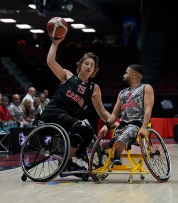 September 9, 2026, Ottawa, On, Canada: Canada s Reed De Aeth (15) passes the ball under pressure from Morocco s Amine Gamri (15) during first half IWBF Wheelchair Basketball World Championships group stage action in Ottawa, Wednesday Sept. 9, 2026. Canada News - September 9, 2026  - ZUMAc35_ 20260909_zaf_c35_092 Copyright: xAdrianxWyldx