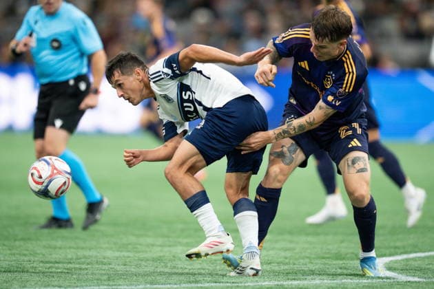 September 9, 2026, Vancouver, Bc, CANADA: Vancouver Whitecaps Andres Cubas, left, and Los Angeles Galaxy s Robert Taylor vie for the ball during the second half of an MLS, Fussball Herren, USA soccer match in Vancouver on Wednesday, Sept. 9, 2026. Canada News - September 9, 2026 - ZUMAc35_ 20260909_zaf_c35_168 Copyright: xEthanxCairnsx