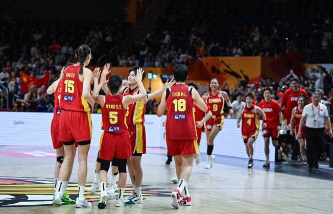 (260910) -- BERLIN, Sept. 10, 2026 -- Players of China celebrate victory after the qualification to quarter-finals match between China and Puerto Rico at the FIBA Women s Basketball World Cup 2026 in Berlin, Germany, Sept. 9, 2026. ) (SP)GERMANY-BERLIN-BASKETBALL-WOMEN S WORLD CUP-CHN VS PUR ZhangxHaofu 