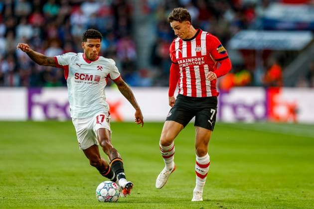 EINDHOVEN , 10-09-2026 , Philips stadium, season 2026 2027 , UEFA Champions League football , match between PSV and Shakhtar Donetsk, picture shows PSV player Ruben van Bommel and Shakhtar Donetsk player Tobias PSV - Shakhtar Donetsk  x206824532x Copyright: