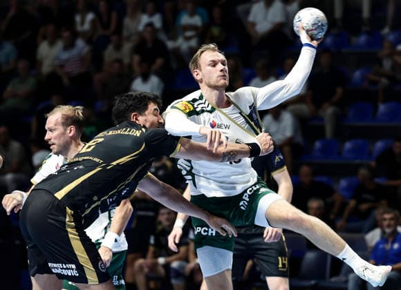 Partizan v Fuchse Berlin - EHF Champions League Mathias Gidsel (R) of Fuchse Berlin in action against Migallon Naranjo Sanchez (L) of Partizan during the EHF Champions League Season 2026 2027 Group Phase match between RK Partizan v Fuchse Berlin at Aleksandar Nikolic Hall on September 10, 2026 in Belgrade, Serbia. Belgrade Serbia Copyright: xSrdjanxStevanovicx x