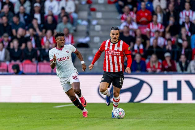 EINDHOVEN - (l-r) Shakhtar Donetsk midfielder Alisson Santana and PSV Eindhoven defender Filip Kostic during the UEFA Champions League match between PSV and Shakhtar Donetsk in Philips Stadion on 10 september 2026 in Eindhoven, Nederland. (Photo by DeFodi Images) -