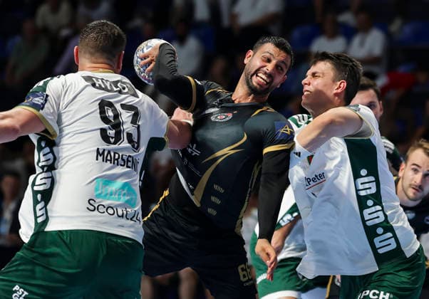 Partizan v Fuchse Berlin - EHF Champions League Yoav Lumbroso (C) of Partizan in action against Mijajlo Marsenic (L) and Frederik SImak (R) during the EHF Champions League Season 2026 2027 Group Phase match between RK Partizan v Fuchse Berlin at Aleksandar Nikolic Hall on September 10, 2026 in Belgrade, Serbia. Belgrade Serbia Copyright: xSrdjanxStevanovicx x