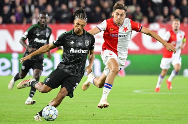 From left Ismaelo Ganiou of Lens and Mojmir Chytil of Slavia in action during the Football Champions League opening round match Slavia Prague vs RC Lens on September 10, 2026, in Prague, Czech Republic. (CTKxPhoto VitxSimanek) CTKPhotoP2026091009827  CTKPhotoP2026091009827