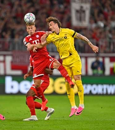 10.09.2026, Fussball UEFA Championsleague 2026 2027: 1.Spieltag, FC Bayern München - FK Bodo Glimt, in der Allianz-Arena München, v.l. Joshua Kimmich (FC Bayern München) gegen Andreas Helmersen (FK Bodo Glimt)