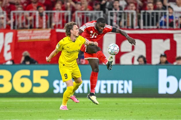Andreas Helmersen (FK Bodo Glimt) and Dayot Upamecano (FC Bayern Muenchen) battle for the ball during the UEFA Champions League 2026 2027 match between Bayern Muenchen and Bodo Glimt at Fussball Arena Muenchen on September 10, 2026 in Munich, Germany. (Photo by Harry Langer DeFodi Images) -