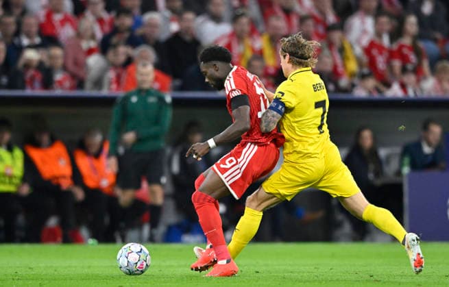 Zweikampf, Aktion Patrick Berg FK Bodoe Glimt (07) gegen Alphonso Davies Bayern FC Muenchen FCB (19) FC Bayern Muenchen FCB vs Bodoe Glimt 10.09.2026 DFL REGULATIONS PROHIBIT ANY USE OF PHOTOGRAPHS AS IMAGE SEQUENCES AND OR QUASI-VIDEO FC Bayern Muenchen FCB vs Bodoe Glimt