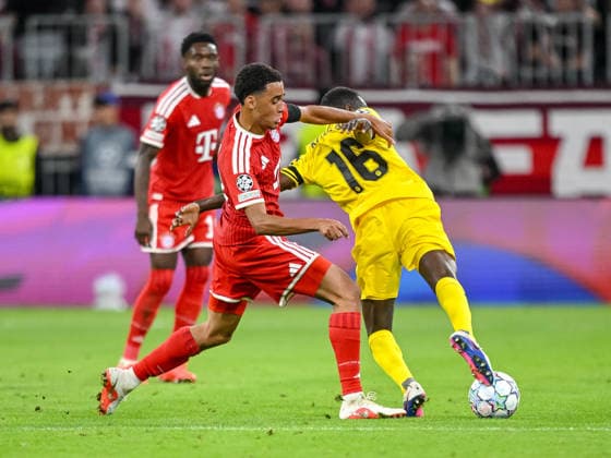 Jamal Musiala (FC Bayern Muenchen) and Joshua Kitolano (FK Bodo Glimt) battle for the ball during the UEFA Champions League 2026 2027 match between Bayern Muenchen and Bodo Glimt at Fussball Arena Muenchen on September 10, 2026 in Munich, Germany. (Photo by Harry Langer DeFodi Images) -