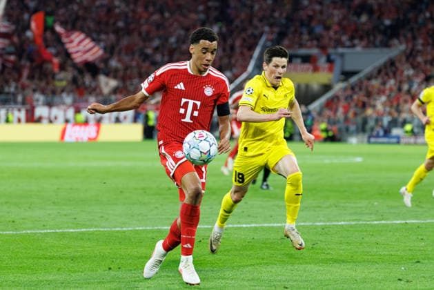 Jamal Musiala (10, FC Bayern München), im Hintergrund Sondre Brunstad Fet (19, FK Bodo Glimt) beim Spiel zwischen FC Bayern München v FK Bodo Glimt, Fussball, Herren, UEFA Champions League, 2026 2027, 1.Spieltag am 10.09.2026 in München, Allianz Arena. Bayern Deutschland