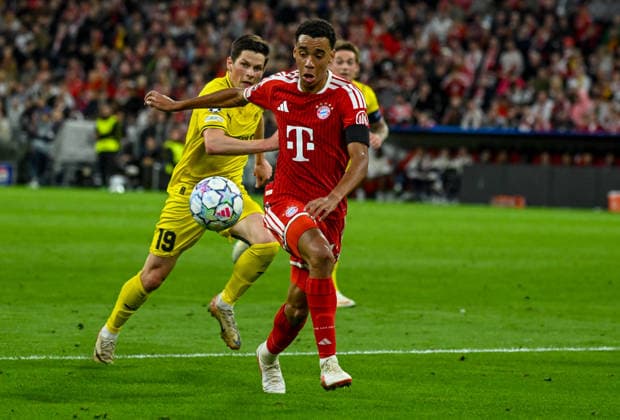10.09.2026, xemx, Fussball UEFA Champions League, FC Bayern Muenchen - FK Bodö Glimt v.l. Sondre Brunstad Fet (FK Bodö Glimt), Jamal Musiala (FC Bayern Muenchen) Zweikampf, Aktion, action, battle for the ball Muenchen